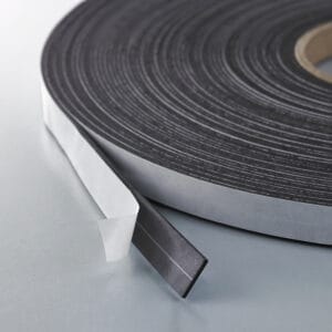 Adhesive-backed magnetic tape on the roll.