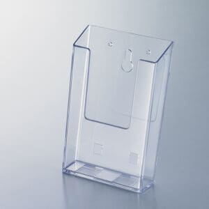 A small-sized, clear, polystyrene, wall-mounting literature holder.