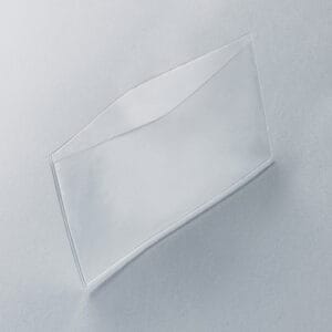 A flexible plastic, clear, adhesive-backed literature pocket.