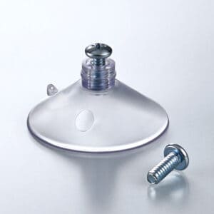A suction cup with an inserted metal screw and additional screw.