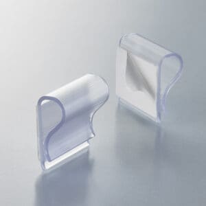 Two R-clips in clear plastic with adhesive backs.