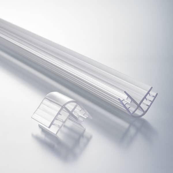 Two right-angle panel forming rails with internal flexible grips in short and long lengths.