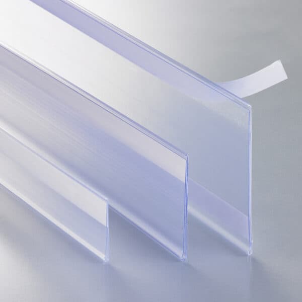 UPC data rails with adhesive strips in three heights for retail sign display.