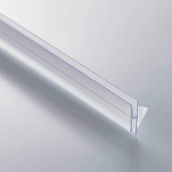 A thin, clear plastic, H-channel with a white foam adhesive strip on the back.