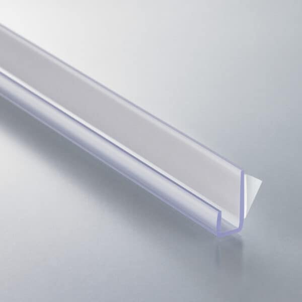 A thick, clear plastic, J-channel with a white foam adhesive strip on the back.