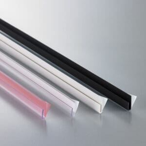 Four thin, plastic, J-channels in clear, white and black with either film or foam adhesive strips on the back.
