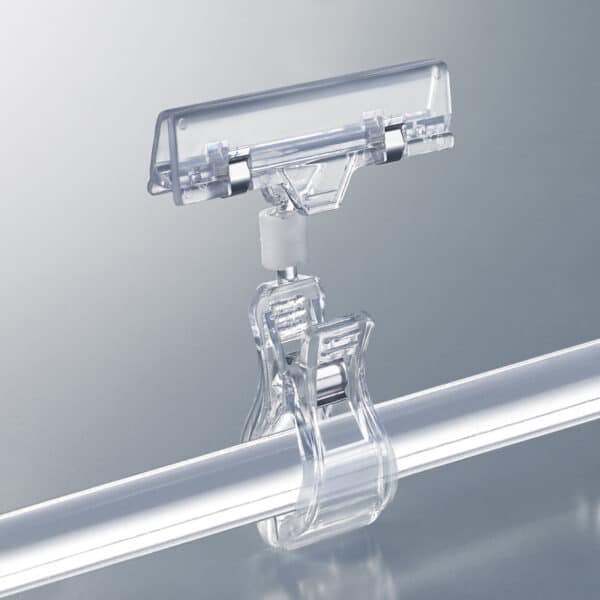 A large clear plastic, double squeeze-clip, sign holder.