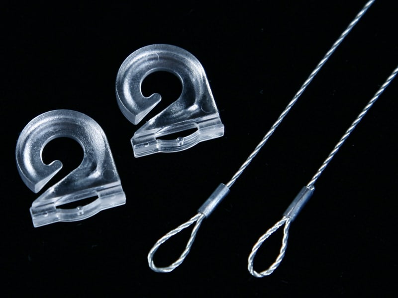 Two plastic clips for sign hanging and two steel looped cables