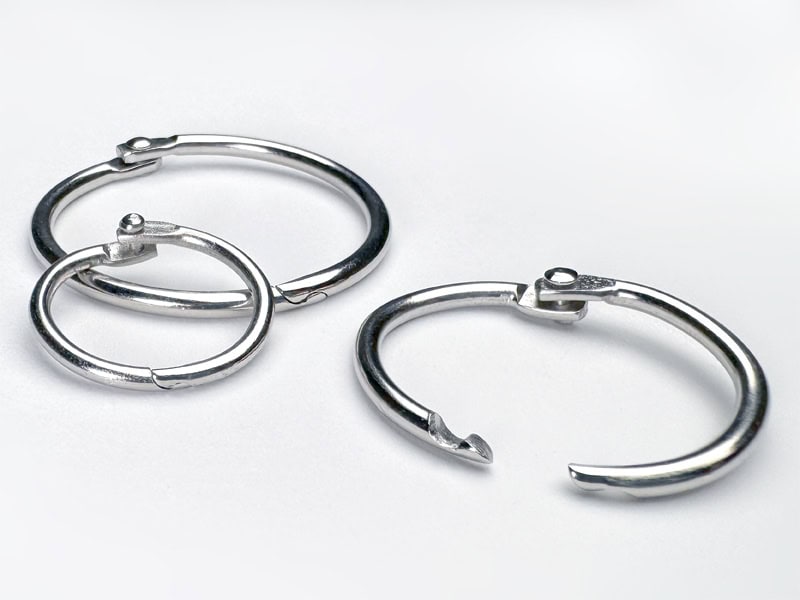 Three Popco steel book rings. Two in closed position and one on open position.