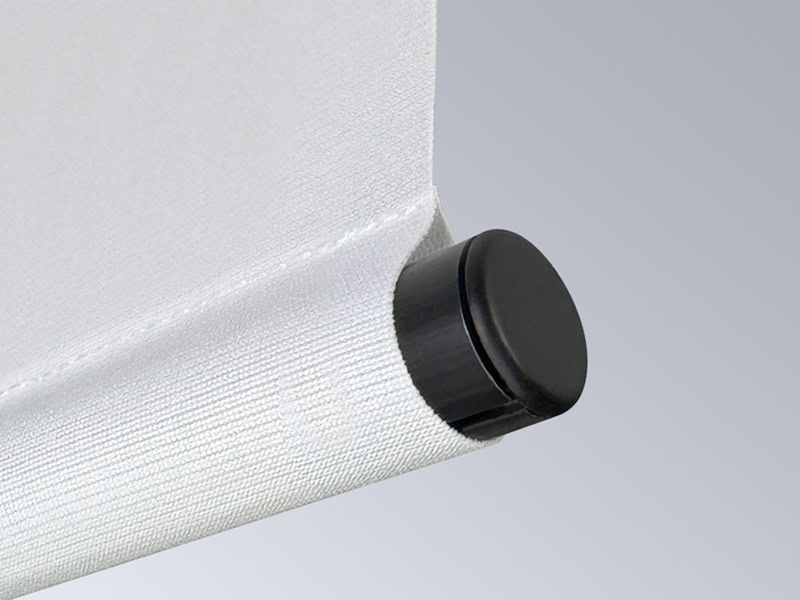 Popco's GruVbanner pocket tube, with a no-loop end cap, shown in use at the bottom of a fabric banner.