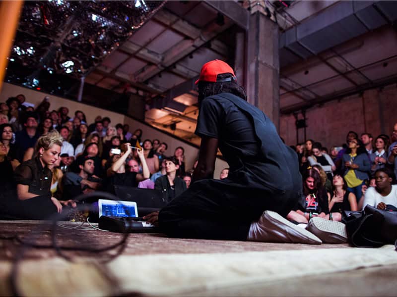 Devonte Hynes, performing electronic music at an event in NYC.